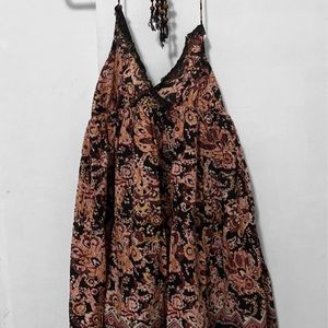 Backless skirt, tai over the neck.